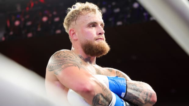 Dec 15, 2023; Orlando, Florida, USA; Jake Paul reacts after knocking out Andre August in the first round at Caribe Royale Orlando. Mandatory Credit: Nathan Ray Seebeck-USA TODAY Sports